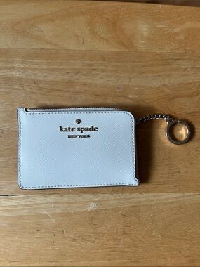 kate spade white saffiano leather zip card case with key ring.